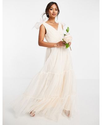 ASOS DESIGN tulle bow tie tiered maxi dress in gold-Neutral