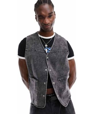 ASOS DESIGN utility vest with acid wash in black