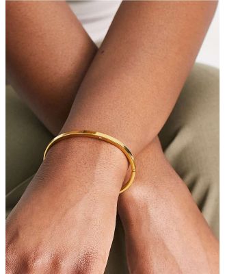 ASOS DESIGN waterproof stainless steel bangle in gold tone