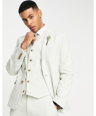 ASOS DESIGN wedding skinny suit jacket in linen mix in micro texture in pastel green