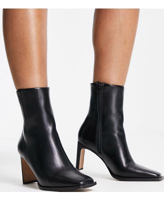 ASOS DESIGN Wide Fit Remmy set back heeled boots in black