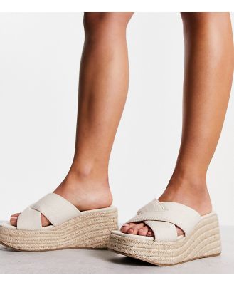 ASOS DESIGN Wide Fit Teddy 2 cross strap wedges in natural fabrication-Neutral
