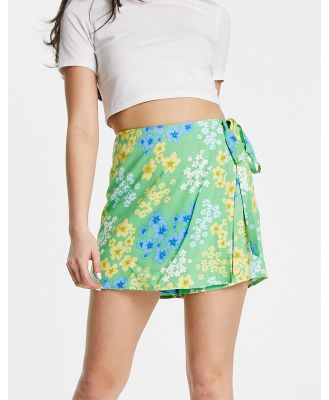 ASOS DESIGN wrap tie skort in green meadow floral print