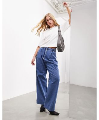 ASOS EDITION denim wide leg pleat front jeans in mid blue