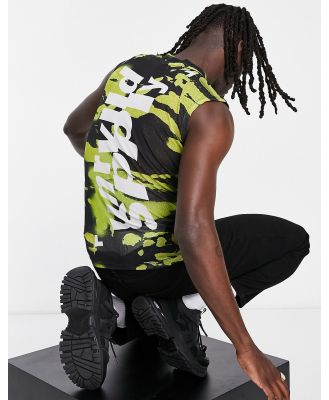 ASOS Unrvlld Spply muscle singlet in power mesh in all over print in lime green