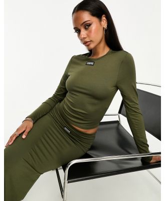 ASOS Weekend Collective long sleeve jersey top with woven label in olive (part of a set)-Green