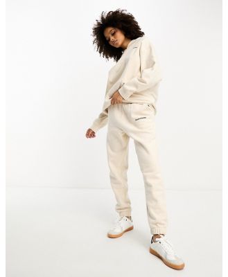 4th & Reckless lounge cuffed trackies with embroidered logo detail in cream-White