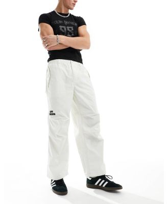 AAPE By A Bathing Ape Carpenter pants in off white