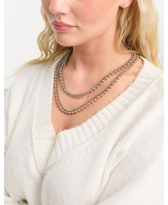 Accessorize layered bead necklace in gold
