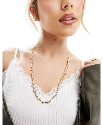 Accessorize wavy necklace in gold