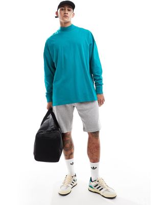 adidas Basketball long sleeve tee in green