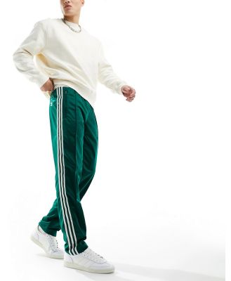 adidas Originals Archive track pants in green and off white