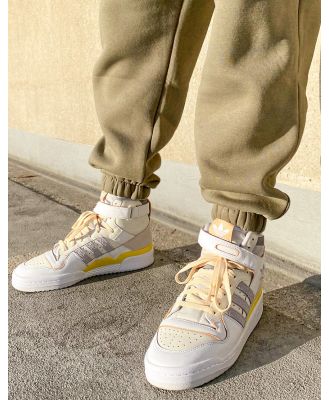 adidas Originals Forum 84 Hi sneakers in white with grey and yellow details