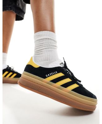 adidas Originals Gazelle Bold platform sneakers in black and gold