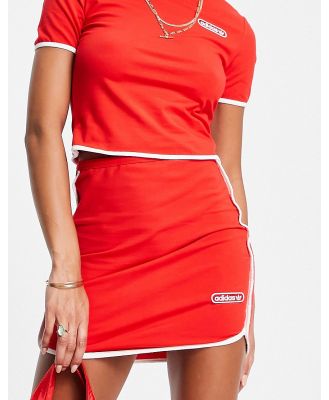 adidas Originals resort mini skirt in red with white binding detail