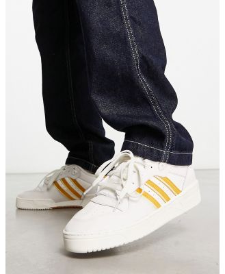 adidas Originals Rivalry Low sneakers in white/gold-Black