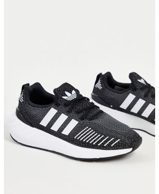 adidas Originals Swift Run 22 trainers in black with white stripes