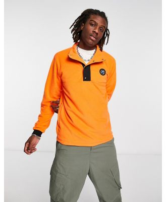 adidas Originals 'Wander Hour' fleece with snap buttons in orange