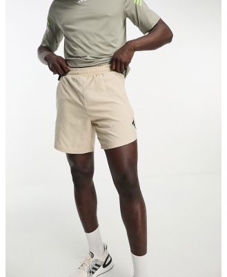 adidas Training Design 4 Movement shorts in beige-White