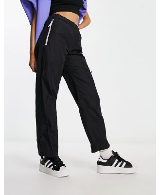 adidas Training Future Icons trackies in black