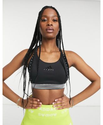 adidas Training mid support bra with taped logo in black