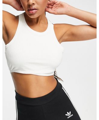 adidas Yoga Studio sleeveless cropped singlet in white
