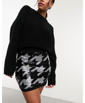 AllSaints Juela Toni sequin mini skirt in black and white