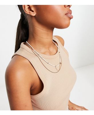 AllSaints multilayer bead necklace in gold and white