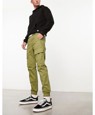 Another Influence cuffed cargo pants in mid green