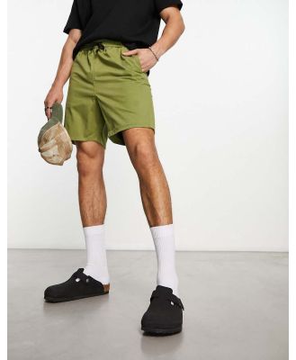 Another Influence oversized chino shorts in khaki-Green