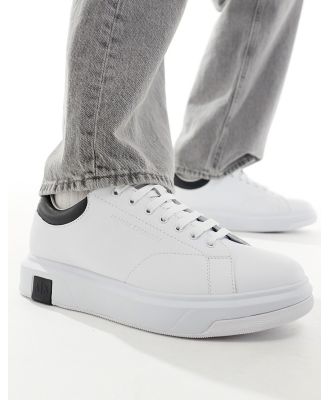 Armani Exchange contrast detail logo leather sneakers in white/black