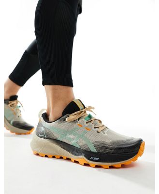 Asics Gel-Trabuco 12 running trainers in feather grey and dark mint