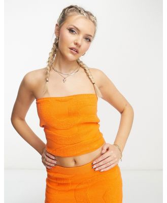 Bailey Rose bandeau crop top in orange wavy knit (part of a set)