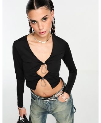 Basic Pleasure Mode bungee cord detail stretch cut-out top in black