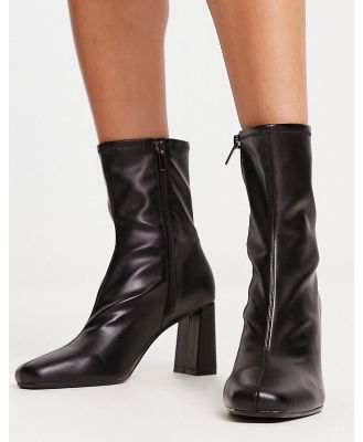 Bershka heeled boots in black