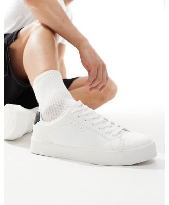 Bershka lace up sneakers with back tab in white