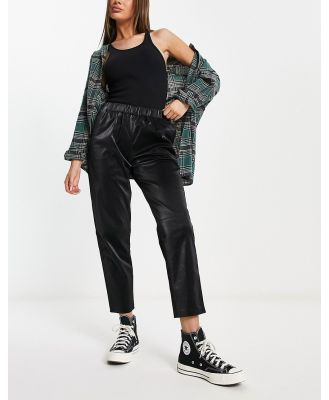 Blank NYC faux leather trackies in black