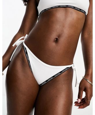 Calvin Klein core logo tape string side tie bikini bottoms in white