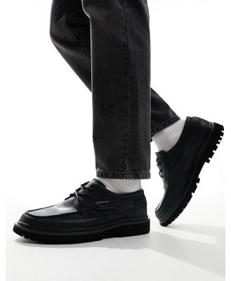 Calvin Klein Jeans hybrid slip on boat shoes in black