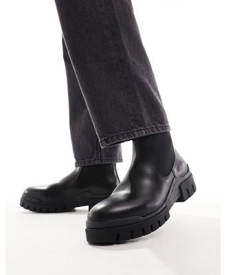 Calvin Klein Jeans leather low commuter boots in black