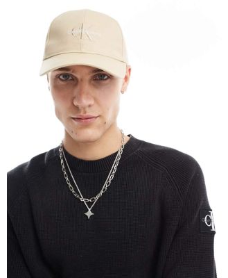 Calvin Klein Jeans logo cap in beige-White