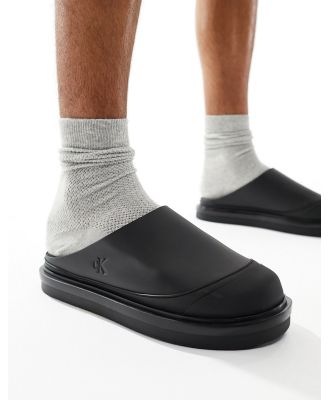 Calvin Klein Jeans slip on clog sandals in black