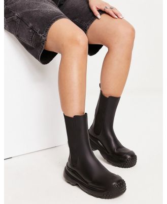 Charles & Keith rubber calf boots in black