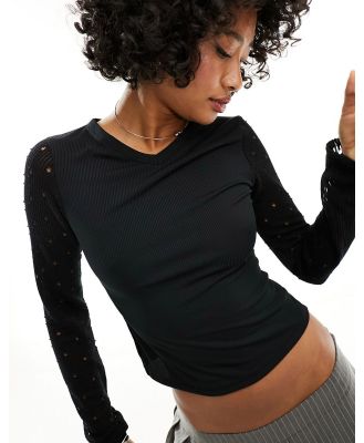 COLLUSION knit long sleeve high v-neck top in black