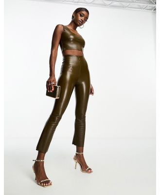 Commando faux leather cropped flare leggings in green (part of a set)