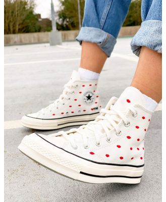 Converse Chuck 70 Hi sneakers in white with lip embroidery