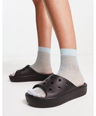 Crocs platform slider sandals in black