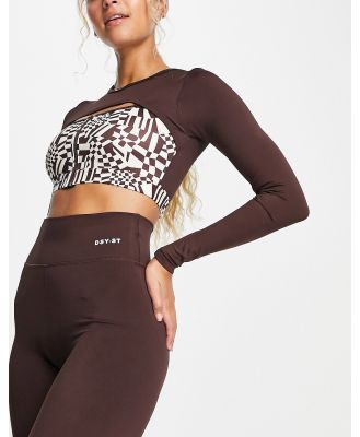 Daisy Street Active Distorted Geo cropped long sleeve top with cutout in brown checkerboard
