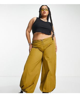 Daisy Street Plus relaxed wide leg parachute pants with drawstring waist in khaki-Green