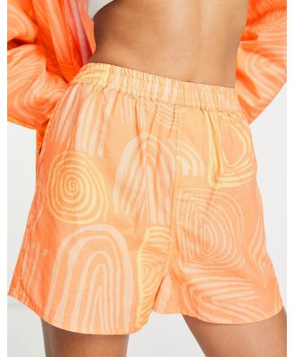 Damson Madder Boycie shorts in orange (part of a set)